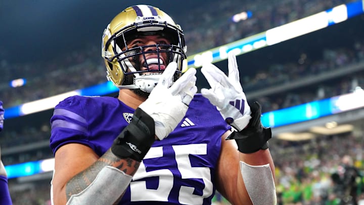 Dec 1, 2023; Las Vegas, NV, USA; Washington Huskies offensive lineman Troy Fautanu (55) celebrates