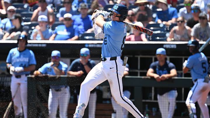 Jun 17, 2026; Omaha, NE, USA; North Carolina Tar Heels center fielder Owen Hull (8) drives in run against the West Virginia Mountaineers during the fourth inning at Charles Schwab Field. Mandatory Credit: Steven Branscombe-Imagn Images Jun 17, 2026; Omaha, NE, USA; North Carolina Tar Heels center fielder Owen Hull (8) drives in run against the West Virginia Mountaineers during the fourth inning at Charles Schwab Field. Mandatory Credit: Steven Branscombe-Imagn Images