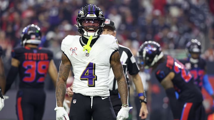 Dec 25, 2024; Houston, Texas, USA; Baltimore Ravens wide receiver Zay Flowers (4) reacts after his first down catch against the Houston Texans  in the first quarter at NRG Stadium. Mandatory Credit: Thomas Shea-Imagn Images