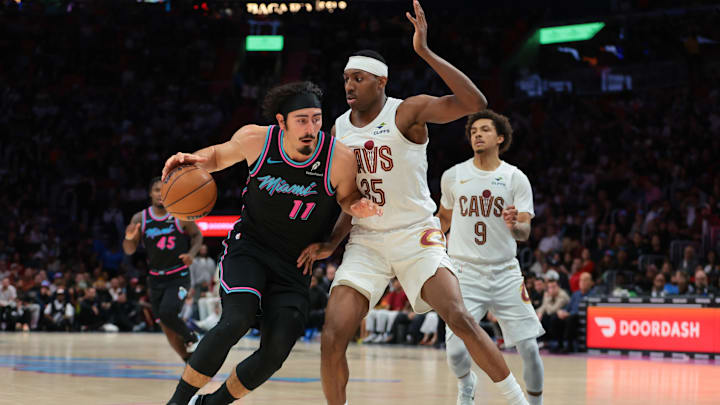 Nov 12, 2025; Miami, Florida, USA; Miami Heat forward Jaime Jaquez Jr. (11) drives to the basket against Cleveland Cavaliers forward Nae’Qwan Tomlin (35) during the fourth quarter at Kaseya Center. Mandatory Credit: Sam Navarro-Imagn Images