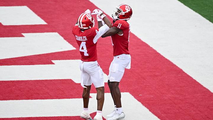 Sep 12, 2026; Bloomington, Indiana, USA; Indiana Hoosiers wide receiver Davion Chandler (4) celebrates with Indiana Hoosiers wide receiver Nick Marsh (11) after a touchdown against the Howard Bison during the second half at Merchants Bank Field at Memorial Stadium. Mandatory Credit: Robert Goddin-Imagn Images