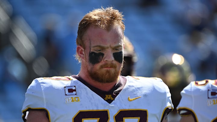 Sep 16, 2023; Chapel Hill, North Carolina, USA;  Minnesota Golden Gophers offensive lineman Quinn Carroll (77) on the field before the game at Kenan Memorial Stadium. Mandatory Credit: Bob Donnan-Imagn Images