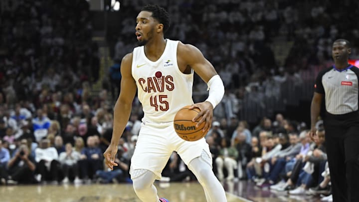 Apr 20, 2024; Cleveland, Ohio, USA; Cleveland Cavaliers guard Donovan Mitchell (45) dribbles the ball in the second quarter against the Orlando Magic during game one of the first round for the 2024 NBA playoffs at Rocket Mortgage FieldHouse. Mandatory Credit: David Richard-Imagn Images