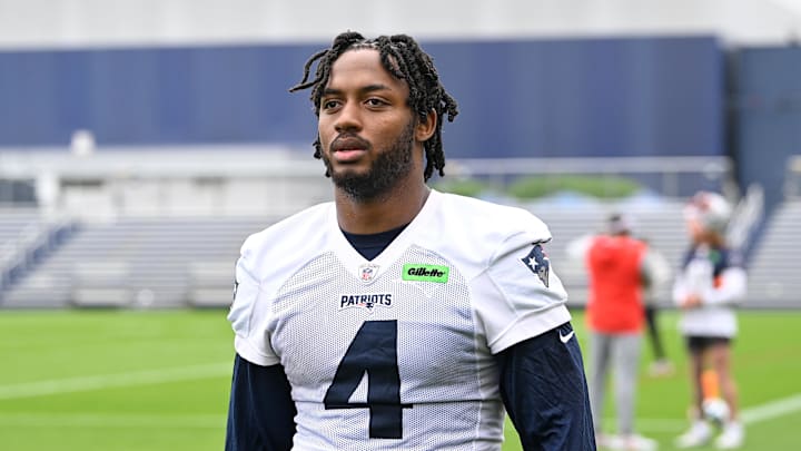 Jun 9, 2025; Foxborough, MA, USA; New England Patriots running back Antonio Gibson (4) leaves the practice fields after minicamp at Gillette Stadium. Mandatory Credit: Eric Canha-Imagn Images