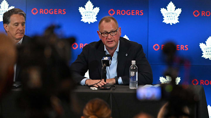 Jun 1, 2023; Toronto, Ontario, CANADA; Toronto Maple Leafs new general manager Brad Treliving is introduced by club president Brendan Shanahan (left) at a press conference at Scotiabank Arena. Mandatory Credit: Dan Hamilton-Imagn Images