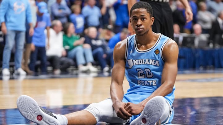 Indiana State Sycamores guard Jayson Kent (20) sits on the ground in disappointment Thursday, April 4, 2024, during the NIT championship game at Hinkle Fieldhouse in Indianapolis. The Seton Hall Pirates defeated the Indiana State Sycamores, 79-77. Indiana State Sycamores guard Jayson Kent (20) sits on the ground in disappointment Thursday, April 4, 2024, during the NIT championship game at Hinkle Fieldhouse in Indianapolis. The Seton Hall Pirates defeated the Indiana State Sycamores, 79-77.