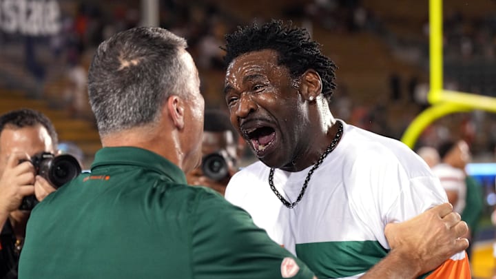 Miami Hurricanes former player Michael Irvin celebrates with head coach Mario Cristobal after the game against the California Golden Bears Miami Hurricanes former player Michael Irvin celebrates with head coach Mario Cristobal after the game against the California Golden Bears