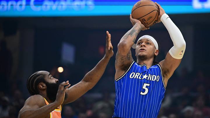 Mar 24, 2026; Cleveland, Ohio, USA; Orlando Magic forward Paolo Banchero (5) shoots against Cleveland Cavaliers guard James Harden (1) during the first half at Rocket Arena. Mandatory Credit: David Dermer-Imagn Images Mar 24, 2026; Cleveland, Ohio, USA; Orlando Magic forward Paolo Banchero (5) shoots against Cleveland Cavaliers guard James Harden (1) during the first half at Rocket Arena. Mandatory Credit: David Dermer-Imagn Images