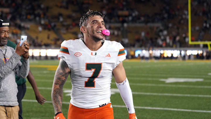 Oct 5, 2024; Berkeley, California, USA; Miami Hurricanes wide receiver Xavier Restrepo (7) celebrates after defeating the California Golden Bears at California Memorial Stadium. Mandatory Credit: Darren Yamashita-Imagn Images