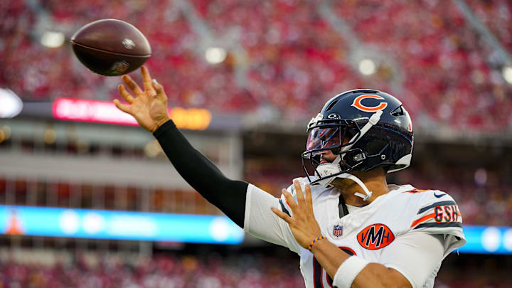 Aug 22, 2025; Kansas City, Missouri, USA; Chicago Bears quarterback Caleb Williams (18) warms up during the first half against the Kansas City Chiefs at GEHA Field at Arrowhead Stadium. 