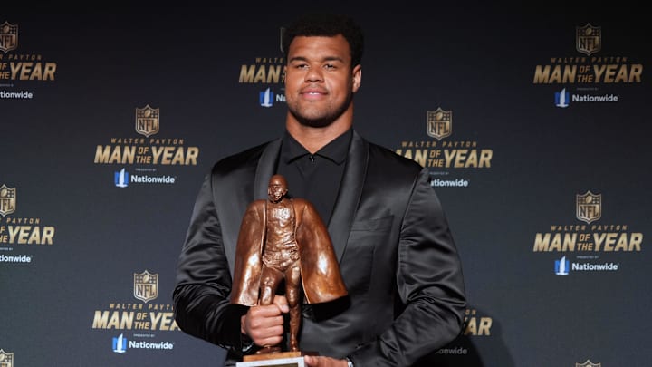 Feb 6, 2025; New Orleans, LA, USA; Jacksonville Jaguars defensive end Arik Armstead poses with the Walter Payton Man of the Year award during Super Bowl LIX NFL Honors at Saenger Theatre.