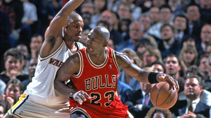 Unknown Date; Oakland, CA, USA; FILE PHOTO; Chicago Bulls guard (23) Michael Jordan in action against Golden State Warriors forward (15) Latrell Sprewell at the Oakland Coliseum. Mandatory Credit: Photo By Imagn Images (c) Copyright 1996 Imagn Images 