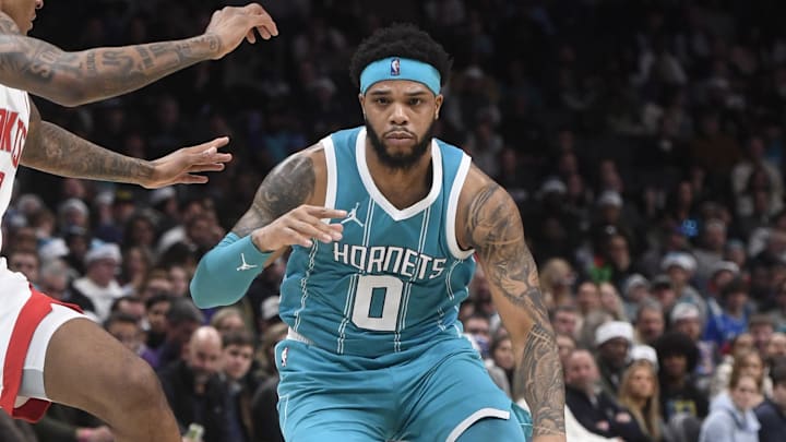 Dec 23, 2024; Charlotte, North Carolina, USA; Charlotte Hornets forward Miles Bridges (0) drives in during the first half against the Charlotte Hornets at the Spectrum Center. Mandatory Credit: Sam Sharpe-Imagn Images Dec 23, 2024; Charlotte, North Carolina, USA; Charlotte Hornets forward Miles Bridges (0) drives in during the first half against the Charlotte Hornets at the Spectrum Center. Mandatory Credit: Sam Sharpe-Imagn Images