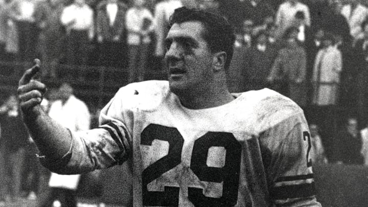 Dec 2, 1962; Chicago, IL, USA; FILE PHOTO; New York Giants  running back Alex Webster (29) gestures after the game against the Chicago Bears at Wrigley Field during the 1962 season.  