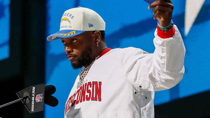 Former Los Angeles Chargers running back Melvin Gordon announces the team’s selection with the 86th overall pick during the third round of the 2025 NFL Draft on Friday, April 25, 2025, at Lambeau Field in Green Bay, Wisconsin.