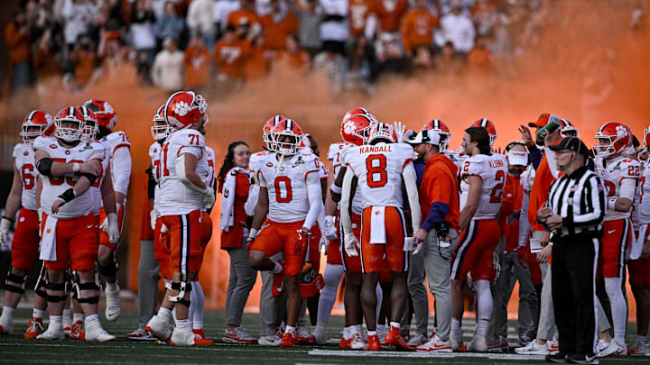 Dec 21, 2024; Austin, Texas, USA; A view of the Clemson Tigers and orange smoke during the game between the Texas Longhorns and the Clemson Tigers in the CFP National Playoff First Round at Darrell K Royal-Texas Memorial Stadium. Mandatory Credit: Jerome Miron-Imagn Images