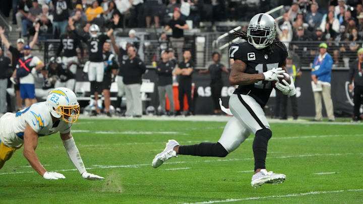 Dec 4, 2022; Paradise, Nevada, USA; Las Vegas Raiders wide receiver Davante Adams (17) scores on a
