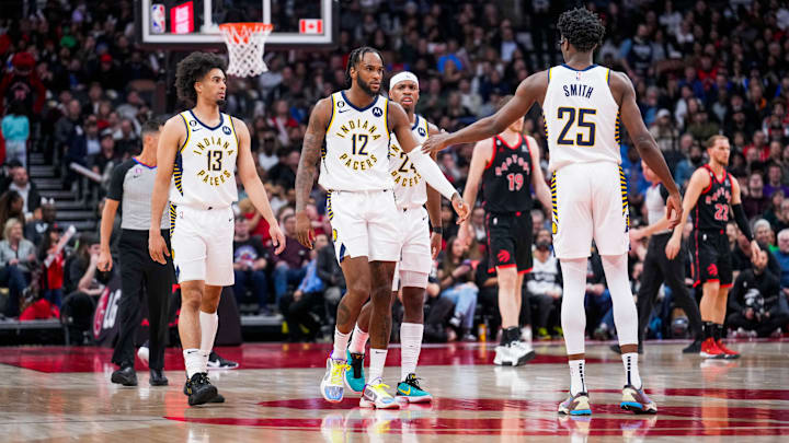 Indiana Pacers players Oshae Brissett (12), Jordan Nwora (13), Buddy Hield (24), and Jalen Smith (25)
