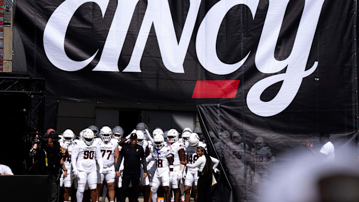 Cincinnati Bearcats head coach Scott Satterfield stands with his team before taking the field before the NCAA football game between the Cincinnati Bearcats and Bowling Green Falcons at Nippert Stadium in Cincinnati on Sept. 6, 2025.