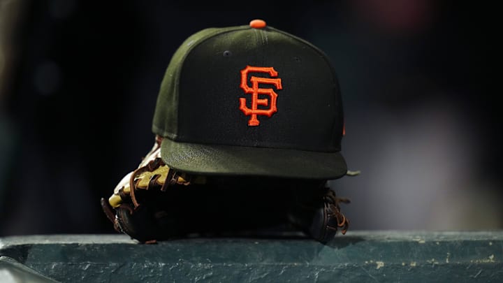 General view of a San Francisco Giants cap and glove. General view of a San Francisco Giants cap and glove.