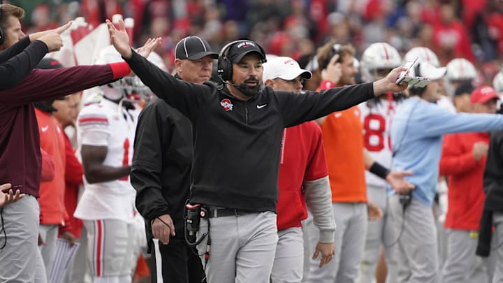 Nov 16, 2024; Chicago, Illinois, USA; Ohio State Buckeyes head coach Ryan Day gestures to the officials against the Northwestern Wildcats during the second half at Wrigley Field.