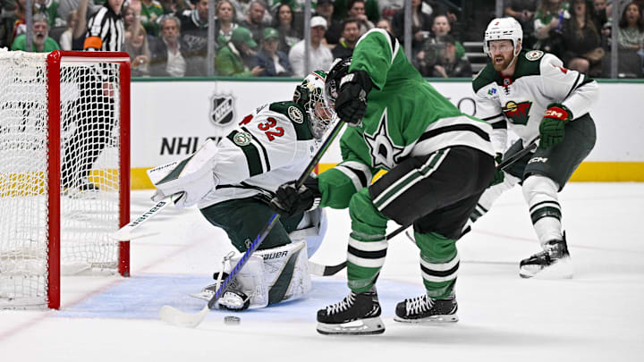 Apr 9, 2026; Dallas, Texas, USA; Dallas Stars center Cameron Hughes (34) scores his first career NHL goal during the second period against Minnesota Wild goaltender Filip Gustavsson (32) at the American Airlines Center. Mandatory Credit: Jerome Miron-Imagn Images