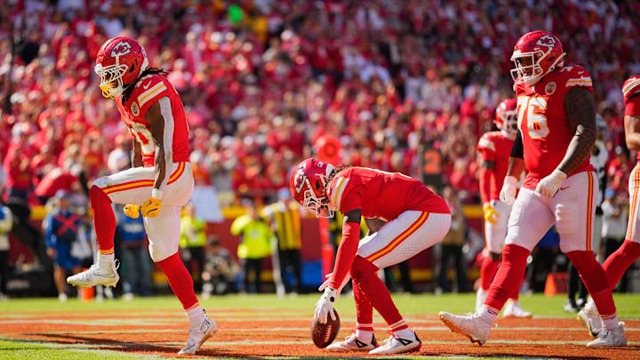 Oct 19, 2025; Kansas City, Missouri, USA; Kansas City Chiefs running back Isiah Pacheco (10) celebrates after scoring a touchdown against the Las Vegas Raiders during the third quarter of the game at GEHA Field at Arrowhead Stadium. Mandatory Credit: Jay Biggerstaff-Imagn Images