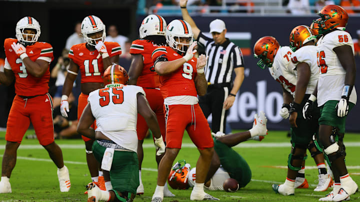 Sep 7, 2024; Miami Gardens, Florida, USA; Miami Hurricanes defensive lineman Tyler Baron (9) celebrates after sack against Florida A&M Rattlers quarterback Daniel Richardson (not pictured) during the second quarter at Hard Rock Stadium. Mandatory Credit: Sam Navarro-Imagn Images Sep 7, 2024; Miami Gardens, Florida, USA; Miami Hurricanes defensive lineman Tyler Baron (9) celebrates after sack against Florida A&M Rattlers quarterback Daniel Richardson (not pictured) during the second quarter at Hard Rock Stadium. Mandatory Credit: Sam Navarro-Imagn Images