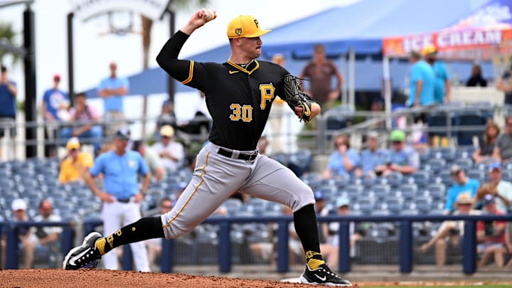 Pittsburgh Pirates pitcher Paul Skenes (30) throws a pitch in the fourth inning of the spring training game against the Tampa Bay Rays at CoolToday Park. 