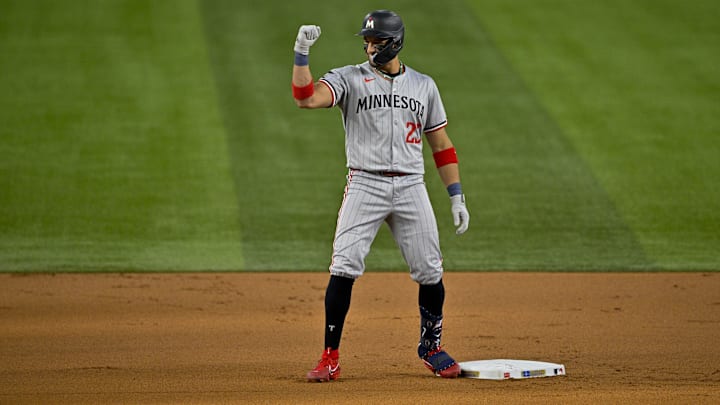 Royce Lewis celebrates a double