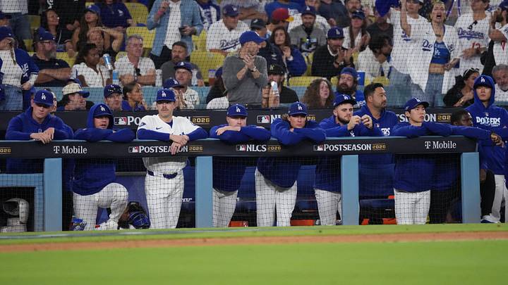 Oct 14, 2026; Los Angeles, California, USA; The Los Angeles Dodgers dugout looks on during the ninth inning in game three of the NLCS for the 2026 MLB playoffs against the Milwaukee Brewers at Uniqlo Field at Dodger Stadium. Mandatory Credit: Kirby Lee-Imagn Images Oct 14, 2026; Los Angeles, California, USA; The Los Angeles Dodgers dugout looks on during the ninth inning in game three of the NLCS for the 2026 MLB playoffs against the Milwaukee Brewers at Uniqlo Field at Dodger Stadium. Mandatory Credit: Kirby Lee-Imagn Images