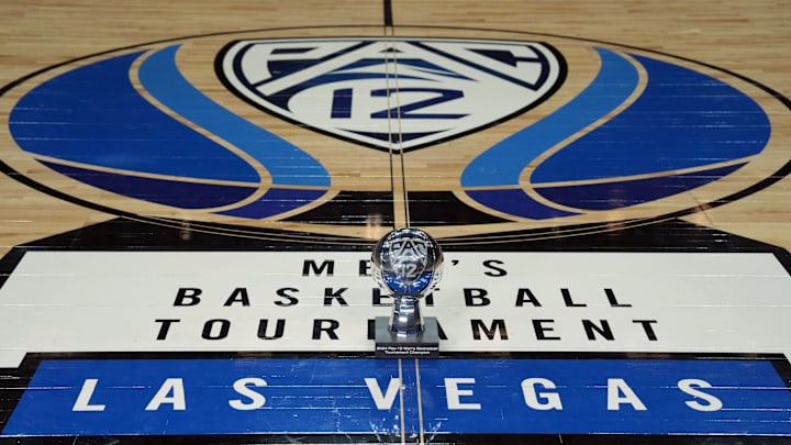 Mar 16, 2024; Las Vegas, NV, USA; The 2024 Pac-12 Conference men's basketball champion trophy at center court on the Pac-12 logo at T-Mobile Arena. Mandatory Credit: Kirby Lee-Imagn Images Mar 16, 2024; Las Vegas, NV, USA; The 2024 Pac-12 Conference men's basketball champion trophy at center court on the Pac-12 logo at T-Mobile Arena. Mandatory Credit: Kirby Lee-Imagn Images