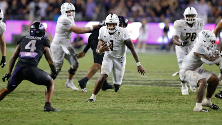 Sep 14, 2024; Fort Worth, Texas, USA; UCF Knights quarterback KJ Jefferson (1) runs with the ball during the fourth quarter against the TCU Horned Frogs at Amon G. Carter Stadium. Mandatory Credit: Andrew Dieb-Imagn Images