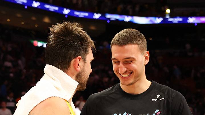 Mar 19, 2026; Miami, Florida, USA; Miami Heat forward Nikola Jovic (5) laughing with Los Angeles Lakers guard Luka Doncic (77) after game against the Los Angeles Lakers at Kaseya Center. Mandatory Credit: Isabella Frias-Imagn Images Mar 19, 2026; Miami, Florida, USA; Miami Heat forward Nikola Jovic (5) laughing with Los Angeles Lakers guard Luka Doncic (77) after game against the Los Angeles Lakers at Kaseya Center. Mandatory Credit: Isabella Frias-Imagn Images