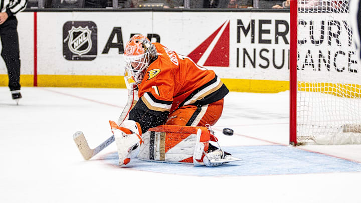 Mar 1, 2026; Anaheim, California, USA; Anaheim Ducks goaltender Lukas Dostal (1) blocks a shot during overtime in the match against the Calgary Flames at Honda Center. Mandatory Credit: Corinne Votaw-Imagn Images