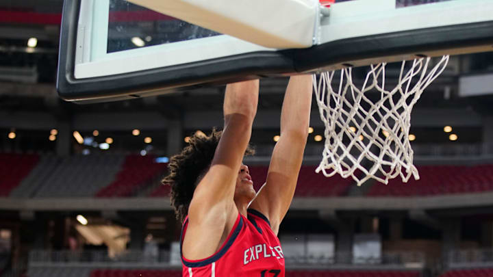 Columbus Explorers forward Cameron Boozer (12) dunks against De La Salle during the Section 7 Basketball Tournament at State Farm Stadium in Glendale on June 23, 2023.