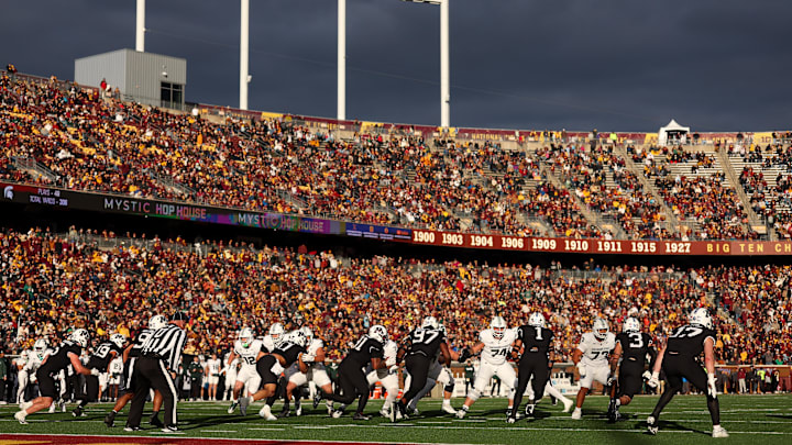 Nov 1, 2025; Minneapolis, Minnesota, USA; Michigan State Spartans runs a play against the Minnesota Golden Gophers during the second half at Huntington Bank Stadium. Mandatory Credit: Matt Krohn-Imagn Images