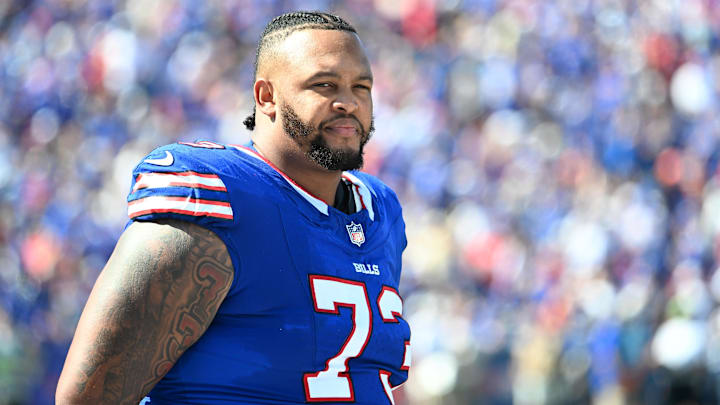 Sep 28, 2025; Orchard Park, New York, USA;  Buffalo Bills offensive tackle Dion Dawkins (73) on the sidelines during the second quarter against the New Orleans Saints at Highmark Stadium.