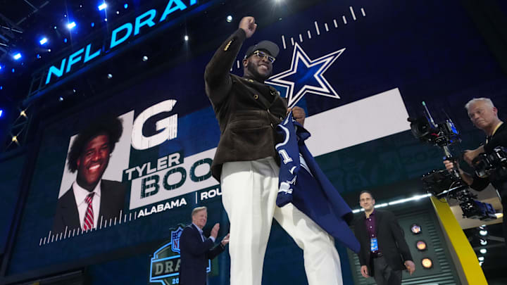 Apr 24, 2025; Green Bay, WI, USA; Alabama Crimson Tide offensive lineman Tyler Booker is selected by the Dallas Cowboys as the number twelve pick in the first round of the 2025 NFL Draft at Lambeau Field. Mandatory Credit: Kirby Lee-Imagn Images