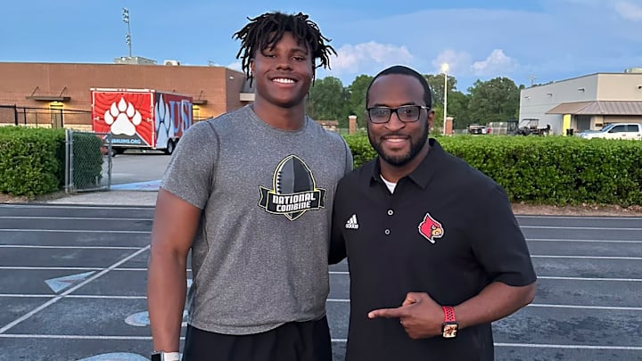 Jackson (Tenn.) University School running back Lekhy Thompkins and Louisville running backs coach Chris Barclay
