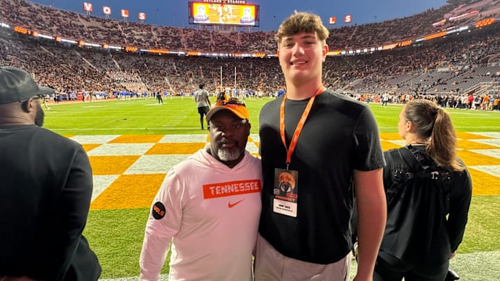Jimmy Kalis 'towers over a Tennessee staffer on a visit to Knoxville.