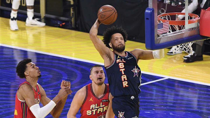 Feb 16, 2025; San Francisco, CA, USA; Kenny’s Young Stars guard Cade Cunningham (2) of the Detroit Pistons shoots against Chuck’s Global Stars forward Victor Wembanyama (1) of the San Antonio Spurs during the 2025 NBA All Star Game at Chase Center. Mandatory Credit: Kyle Terada-Imagn Images