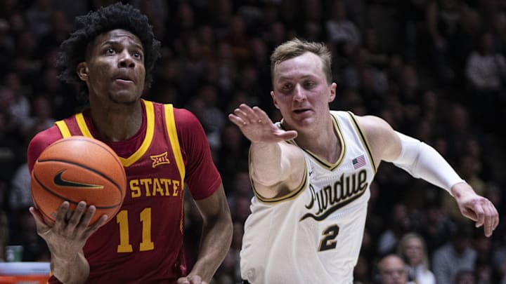 Dec 6, 2025; West Lafayette, Indiana, USA; Iowa State Cyclones guard Dominick Nelson (11) dribbles past Purdue Boilermakers guard Fletcher Loyer (2) during the first half at Mackey Arena. Mandatory Credit: Jacob Musselman-Imagn Images Dec 6, 2025; West Lafayette, Indiana, USA; Iowa State Cyclones guard Dominick Nelson (11) dribbles past Purdue Boilermakers guard Fletcher Loyer (2) during the first half at Mackey Arena. Mandatory Credit: Jacob Musselman-Imagn Images