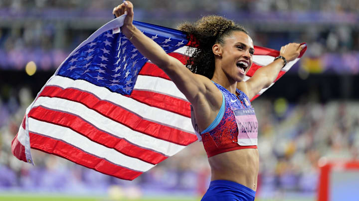 Aug 10, 2024; Paris Saint-Denis, France; Sydney McLaughlin-Levrone (USA) celebrates after winning the womenís 4x400m relay final during the Paris 2024 Olympic Summer Games at Stade de France. 