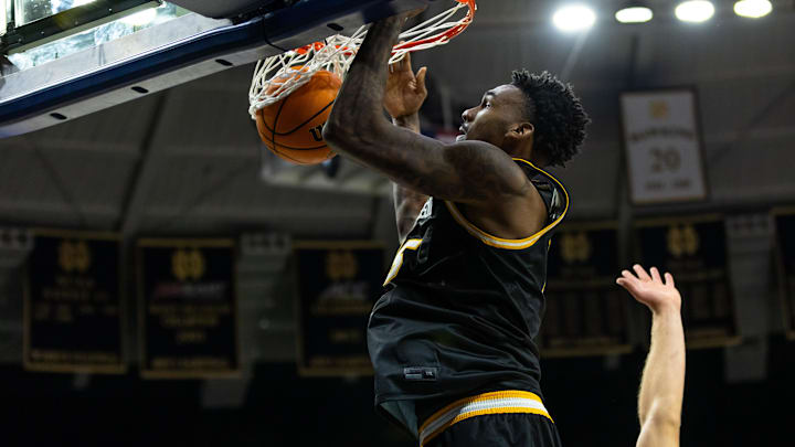 Dec 2, 2025; South Bend, Indiana, USA; Missouri Tigers center Shawn Phillips Jr. (15) dunks against the Notre Dame Fighting Irish during the second half at Purcell Pavilion at the Joyce Center. Mandatory Credit: Michael Caterina-Imagn Images