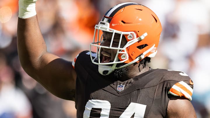 Sep 8, 2024; Cleveland, Ohio, USA; Cleveland Browns defensive tackle Dalvin Tomlinson (94) celebrates his sack against the Dallas Cowboys during the first quarter at Huntington Bank Field. Mandatory Credit: Scott Galvin-Imagn Images Sep 8, 2024; Cleveland, Ohio, USA; Cleveland Browns defensive tackle Dalvin Tomlinson (94) celebrates his sack against the Dallas Cowboys during the first quarter at Huntington Bank Field. Mandatory Credit: Scott Galvin-Imagn Images