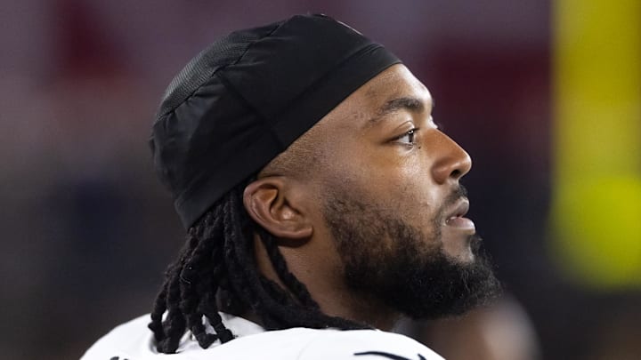 Aug 23, 2025; Glendale, Arizona, USA; Las Vegas Raiders defensive tackle Adam Butler (69) against the Arizona Cardinals during a preseason NFL game at State Farm Stadium. Mandatory Credit: Mark J. Rebilas-Imagn Images