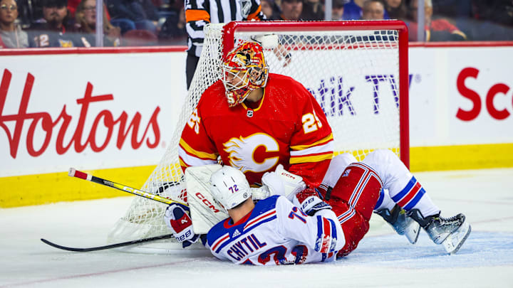 Oct 24, 2023; Calgary, Alberta, CAN; New York Rangers center Filip Chytil (72) and Calgary Flames