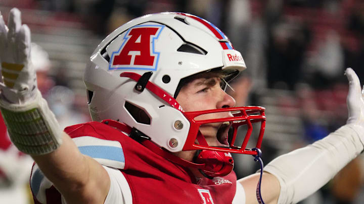 Arrowhead's Ryan Heiman (24) celebrates after returning a kickoff 76 yards for a touchdown, with 35 seconds on the clock, to secure a 18-15 victory over Bay Port in the WIAA Division 1 state football championship game at Camp Randall Stadium in Madison on Friday, Nov. 21, 2025.