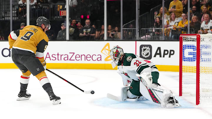 Apr 20, 2025; Las Vegas, Nevada, USA; Vegas Golden Knights center Jack Eichel (9) shoots against Minnesota Wild goaltender Filip Gustavsson (32) during the second period of  game one of the first round of the 2025 Stanley Cup Playoffs at T-Mobile Arena. Mandatory Credit: Stephen R. Sylvanie-Imagn Images